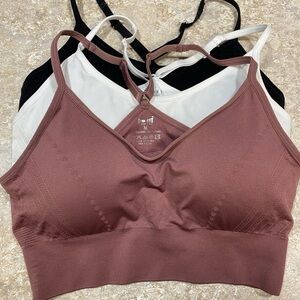 3-Pro-Fit outfitters Women's Seamless Bralette Set - Black, White, and Mauve.